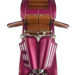 Top view of a vintage car model with a purple body and brown interior on a white background