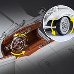 Close-up of a car's interior and wheel with detailed design elements.