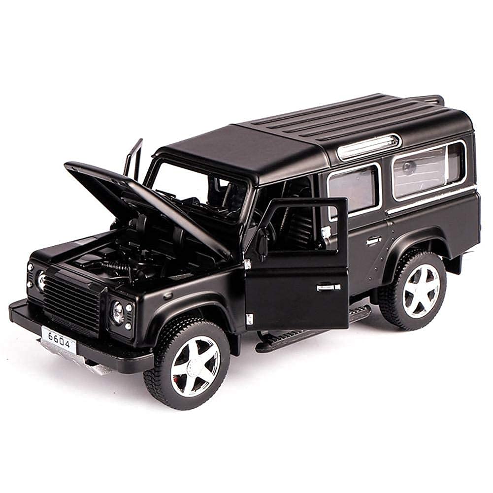 Black toy Land Rover Defender with open doors and hood on a white background