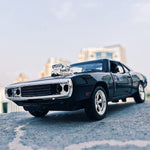 Vintage muscle car on a road with buildings in the background